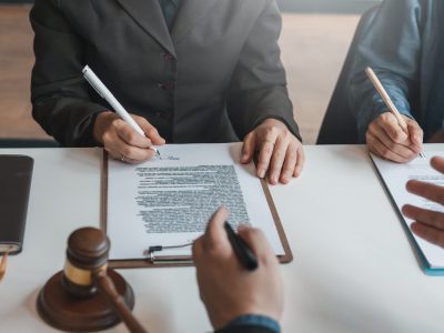 Businessman and lawyer discuss the contract document. Treaty of the law. Sign a contract business.